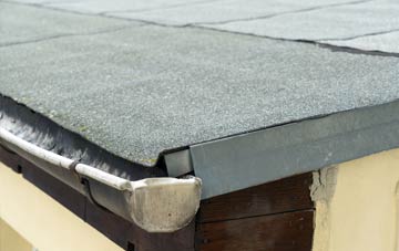 repair or replace Spanish Green flat roofing?